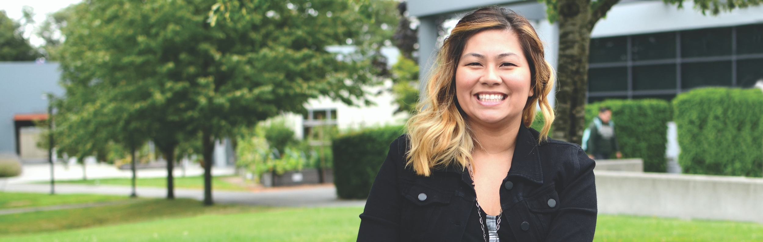  Student using Chromebook in Clock Tower Plaza  