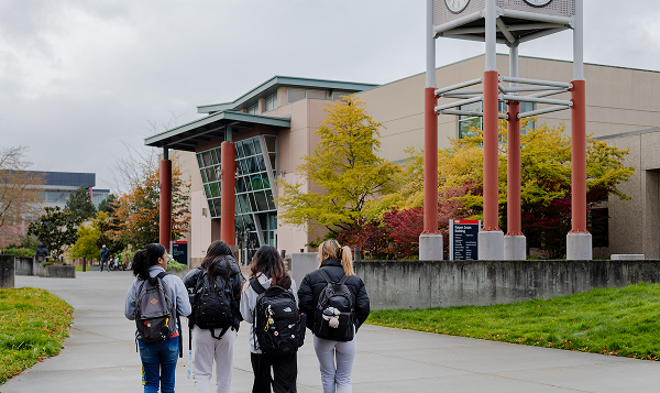 South students walking outside near clocktower