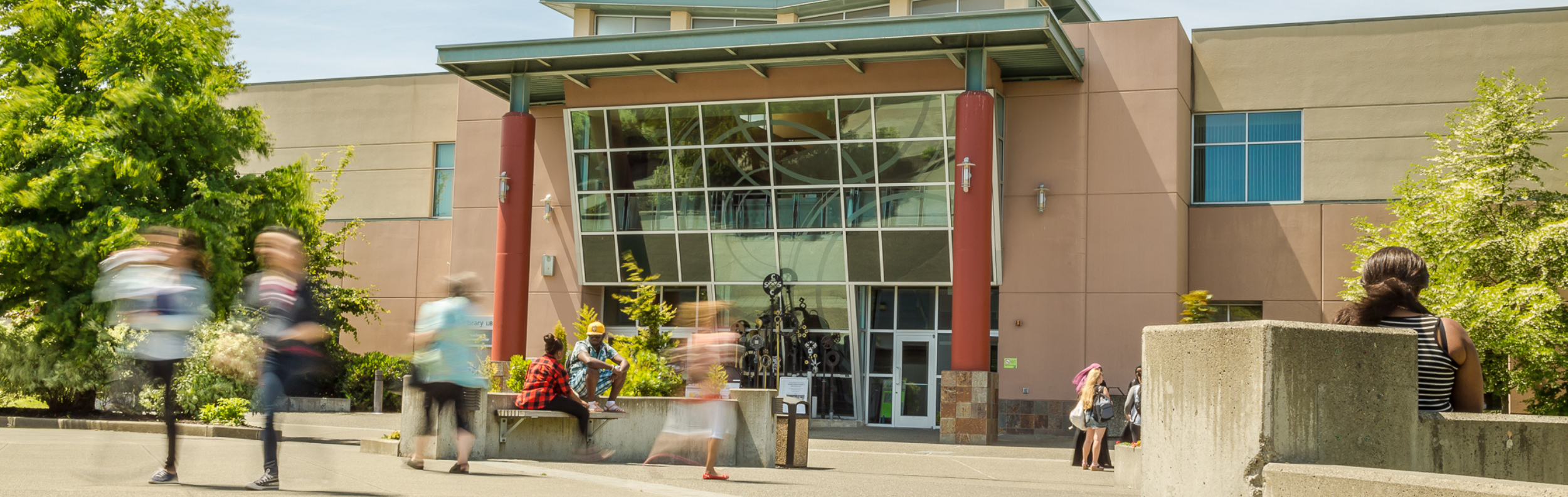  People walking on South Seattle College's campus 
