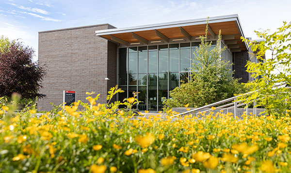 South Seattle College exterior building and flowers in summer