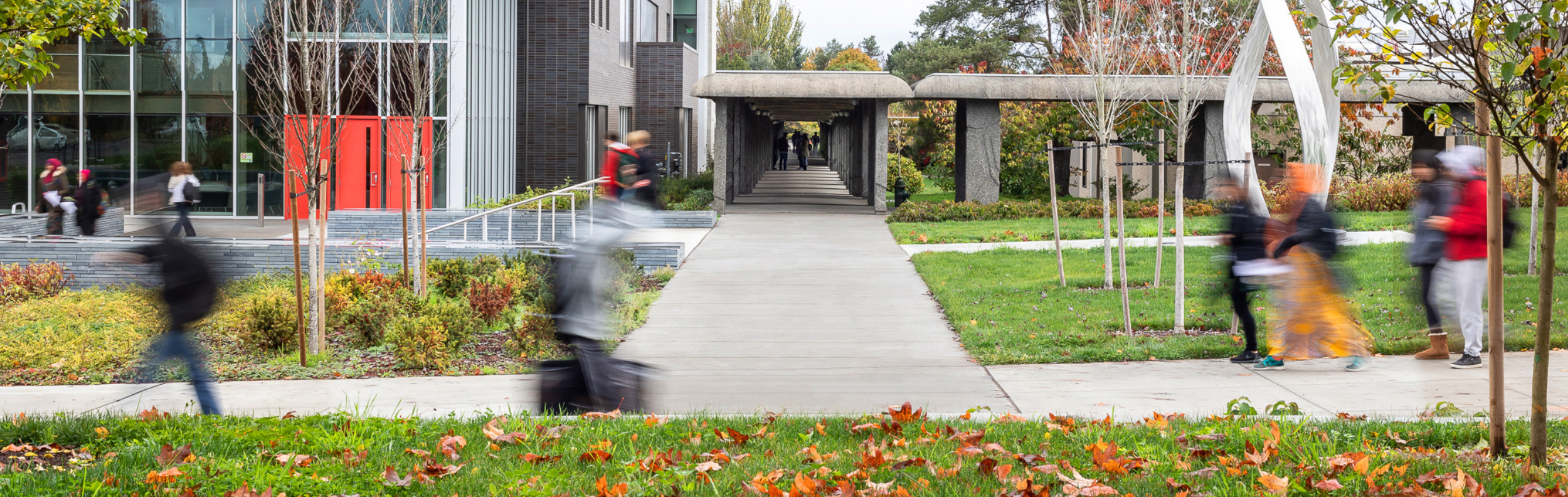  Students walking near Cascade Hall at South Seattle College. 