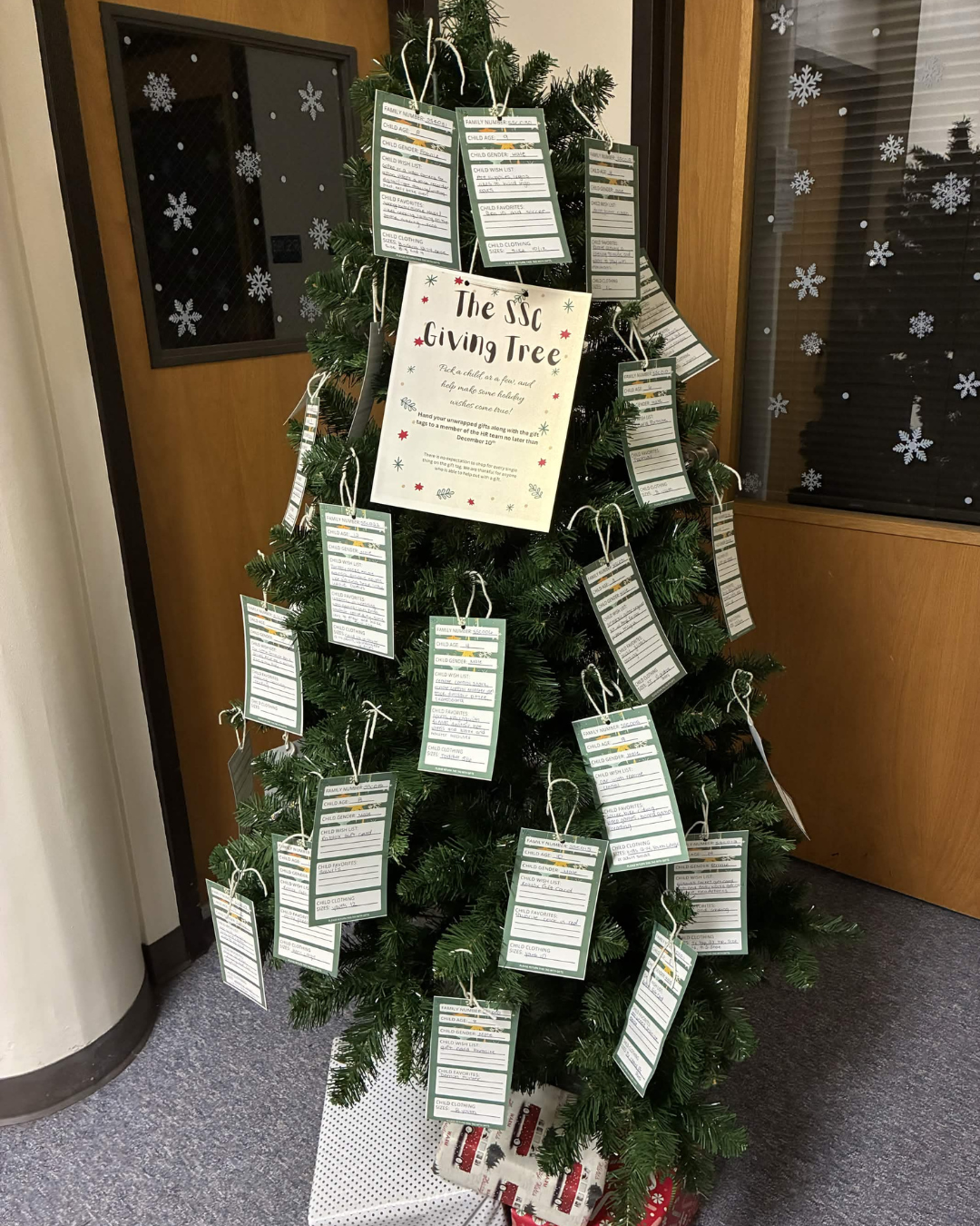The 2025 Giving Tree with student family tags