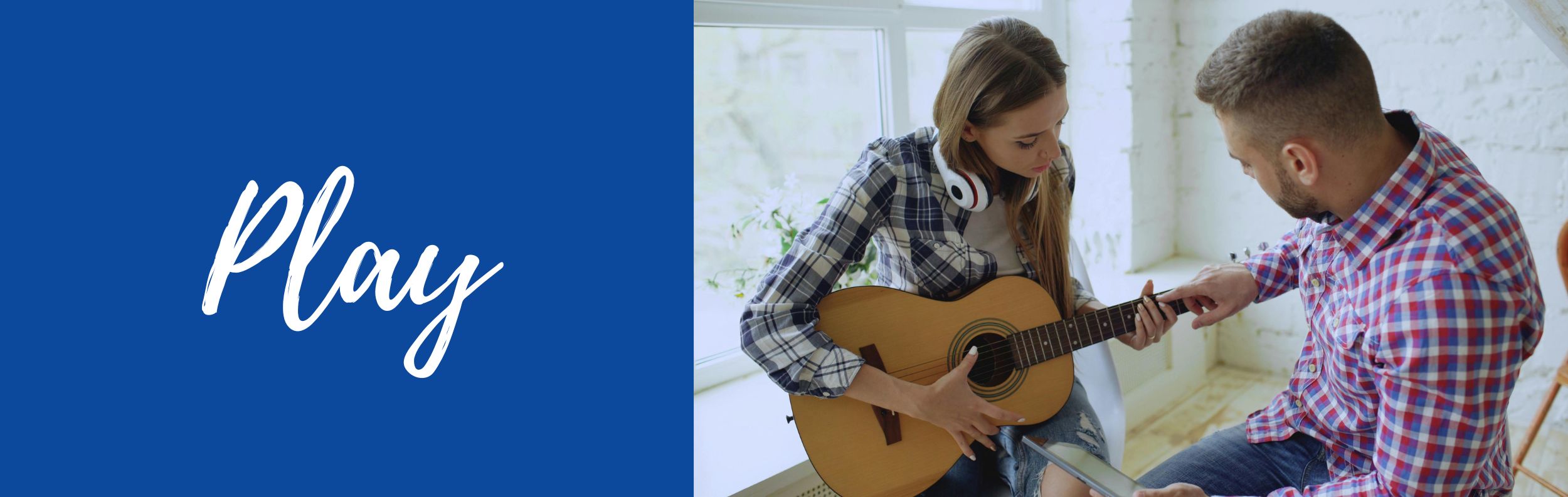 woman learning to play the guitar